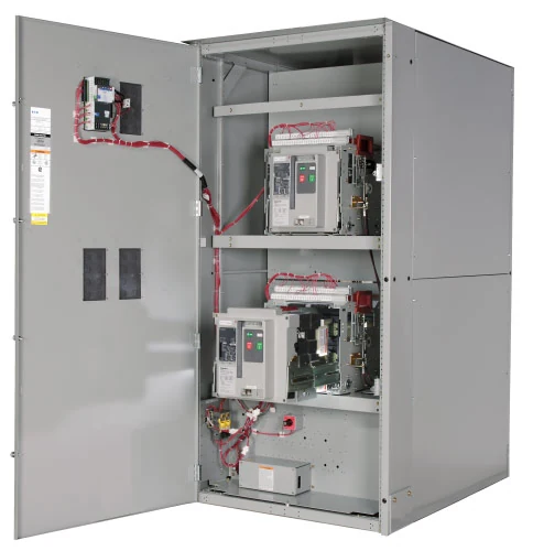 Eaton switchgear cabinet with two breaker units and ATC controller wiring, open door view
